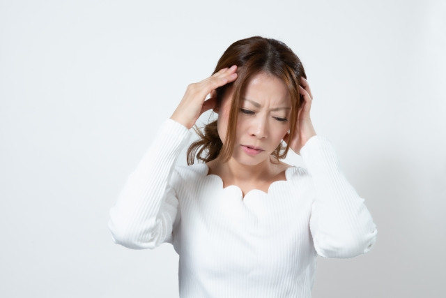頭痛がある女性